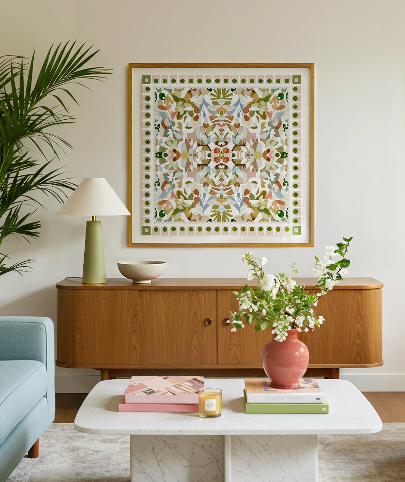 Skybound artwork displayed above a mid century cabinet.
