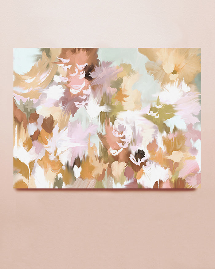 A fine art print featuring abstract foliage in orange, pink, mauve and green hues displayed against a solid background.