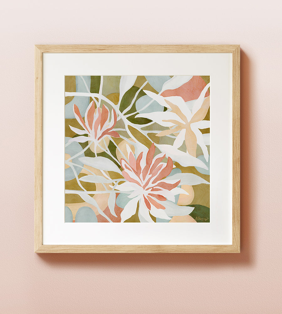 A framed fine art print with a colorful abstract floral design in green, pink and light blue, displayed against a neutral background.