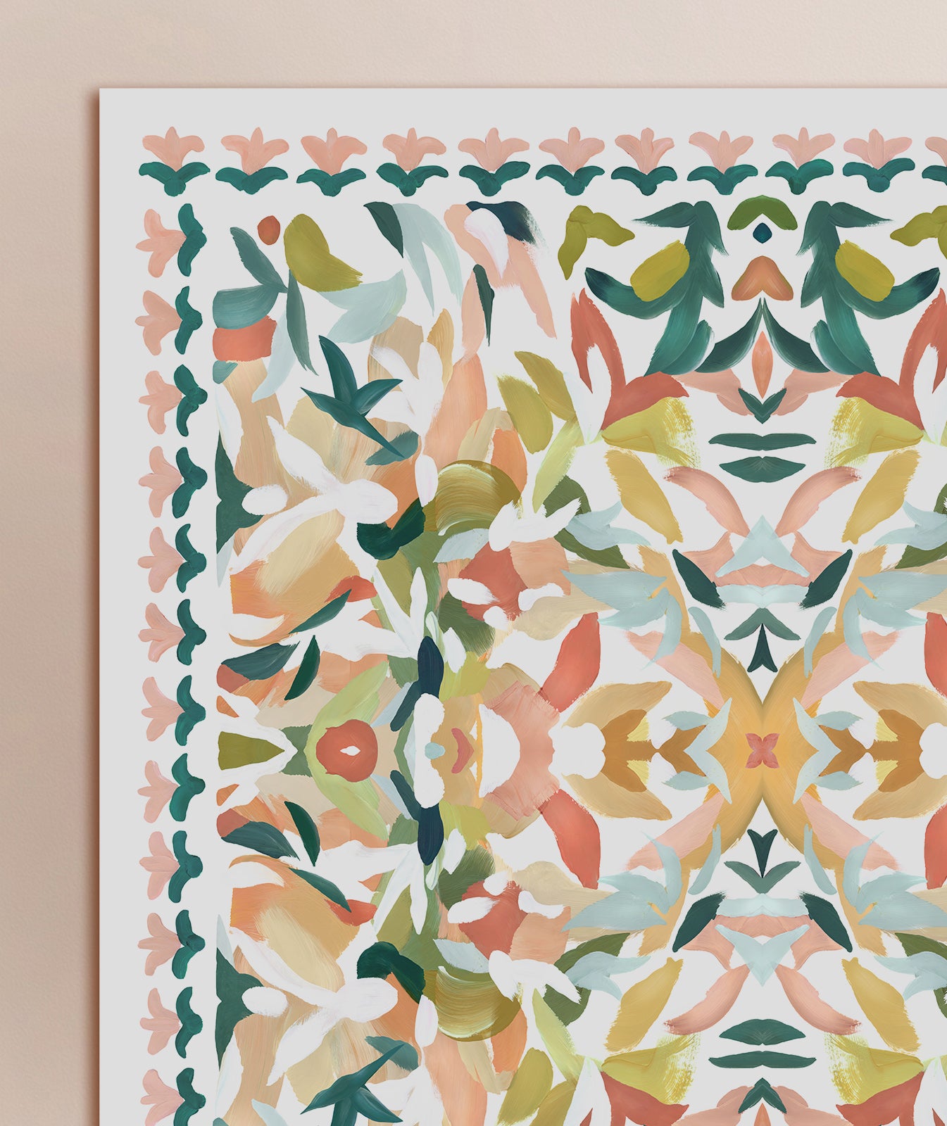 A close-up view of a kaleidoscopic art print featuring turquoise, green, pink, yellow and red colors with abstract floral elements displayed on a solid background.
